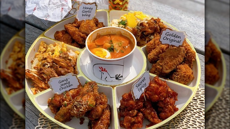 Various flavors of bb.q Chicken arranged on a platter