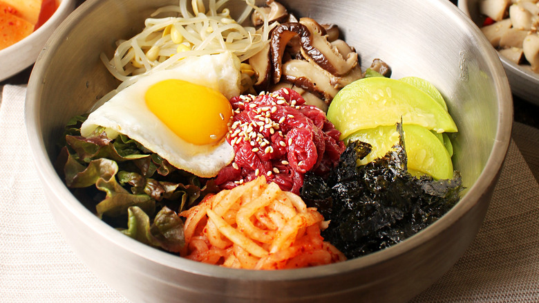 Bibimbap with raw beef topping