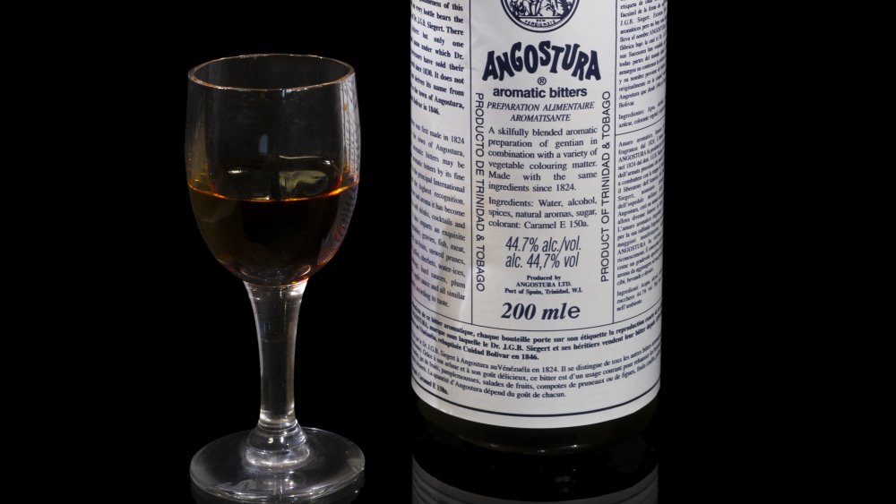 Angostura bottle with shotglass