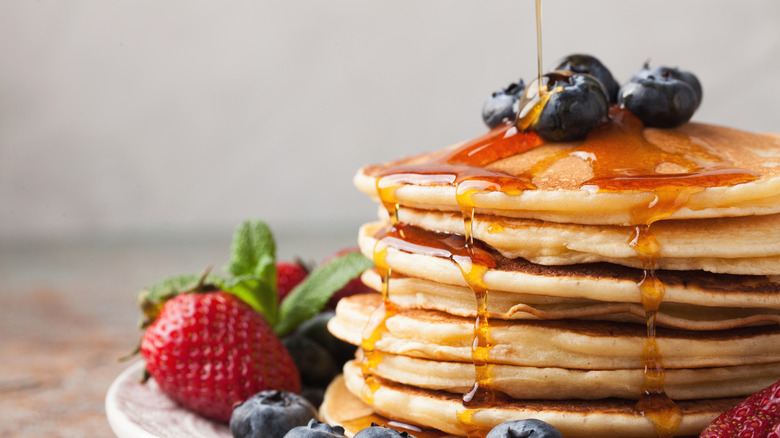 Stack of pancakes with fruit