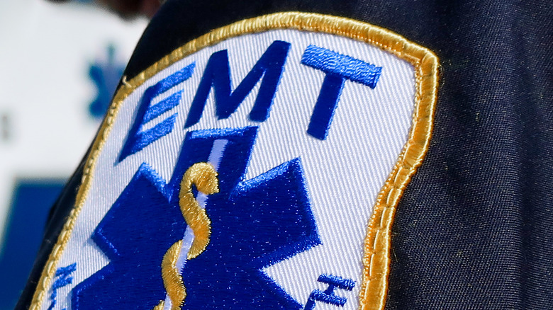 EMT patch on navy blue uniform