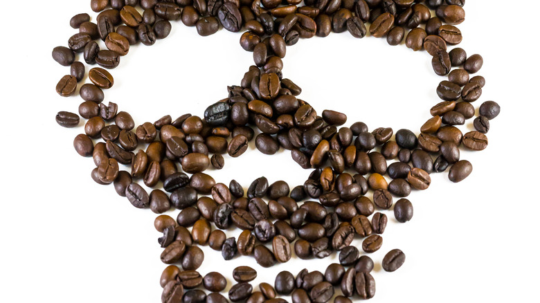 Coffee beans arrayed into skeleton head