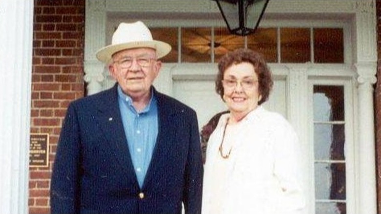 Bob and Jewell Evans outside home 