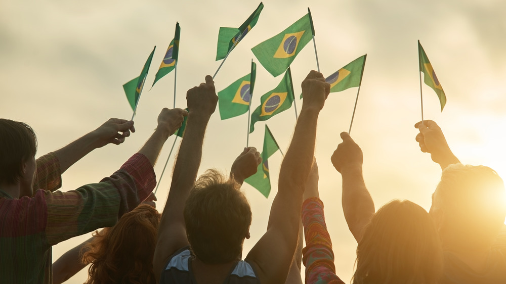 Brazilian flags waved in the sky