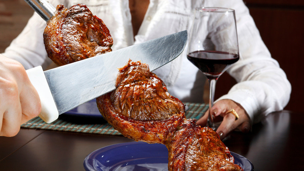 Picanha cut with a knife