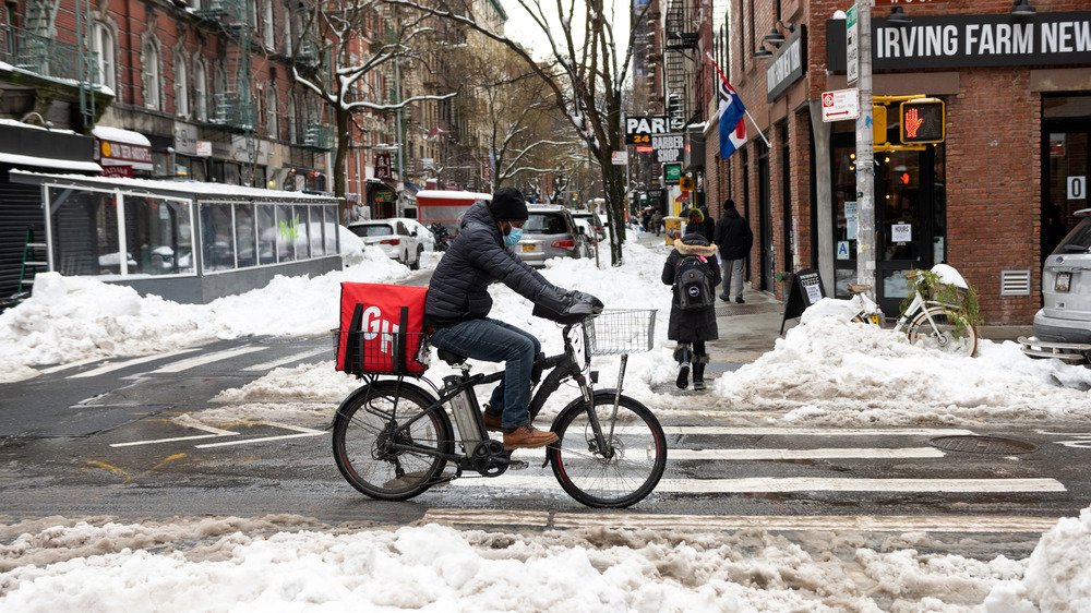 Grubhub delivery person on a bike