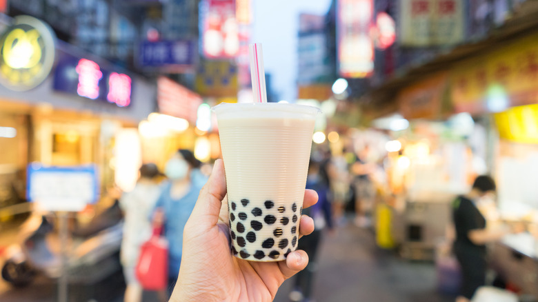 holding bubble tea