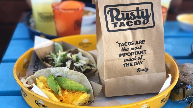 rusty taco paper bag and tacos