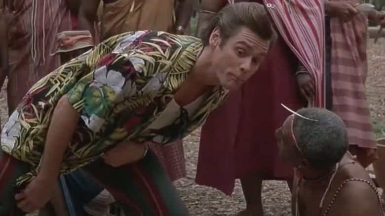 Ace Ventura speaks to villager