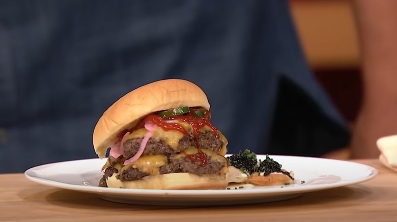 Double cheeseburger with ketchup and onions