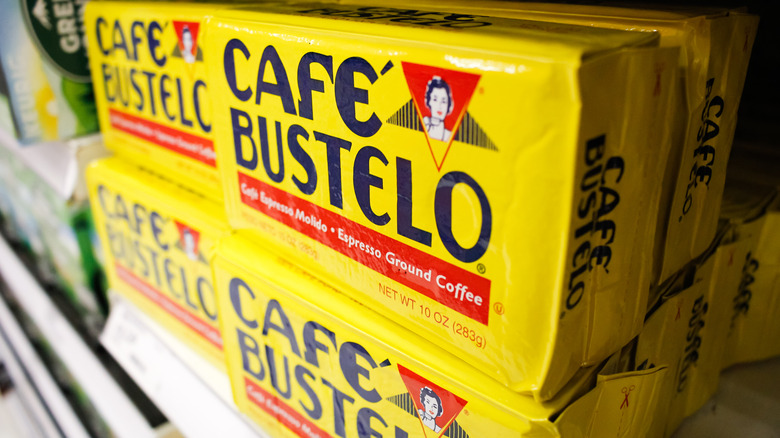 Yellow packages of Café Bustelo on store shelves