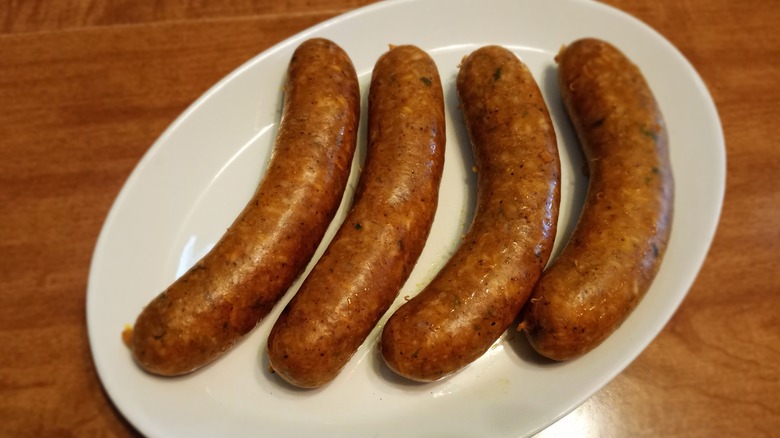 four links of boudin on plate