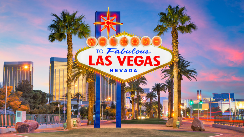 Las Vegas cityscape and a sign that says "Welcome to Fabulous Las Vegas Nevada."