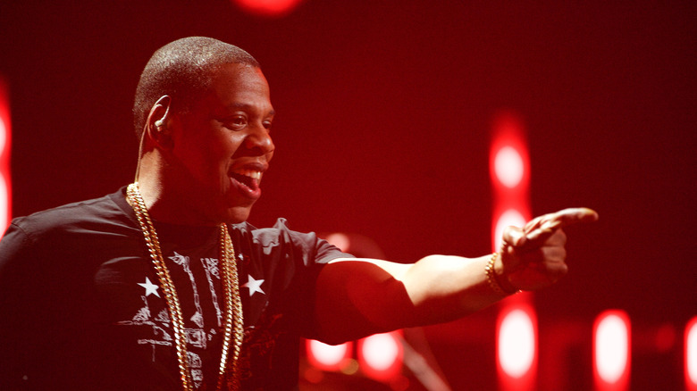 Jay-Z performance smiling on stage
