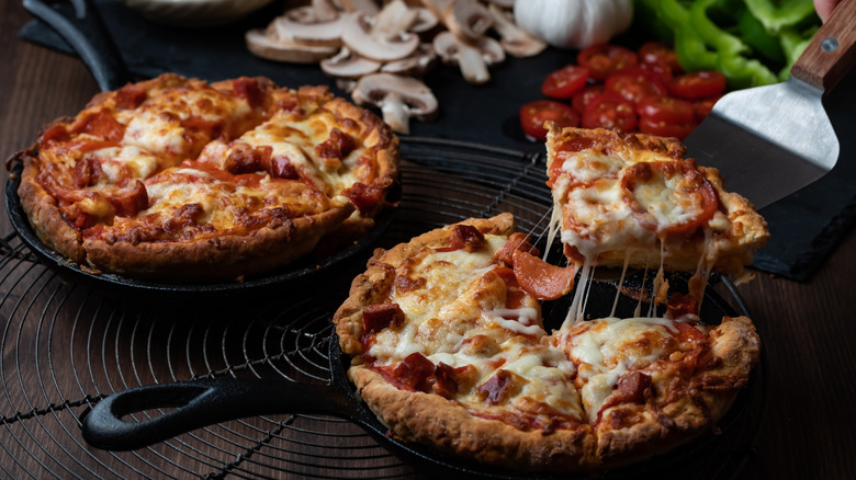 individually sized deep dish pizzas