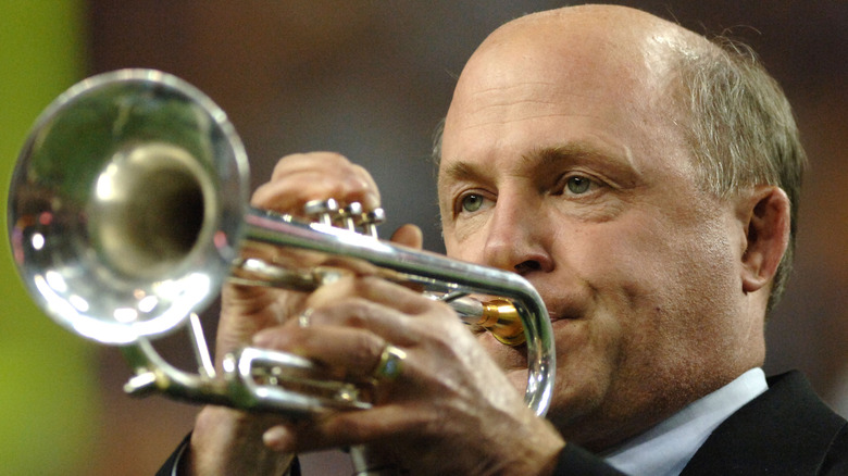 Dan Cathy playing the trumpet