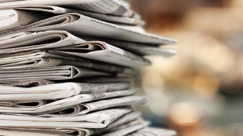 stack of gray newspapers