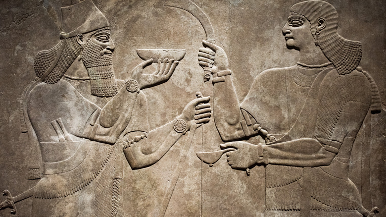 A Mesopotamian relief of two men