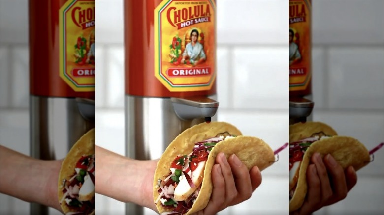 hands-free Cholula dispenser