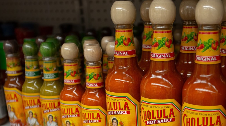 Cholula bottles wooden tops