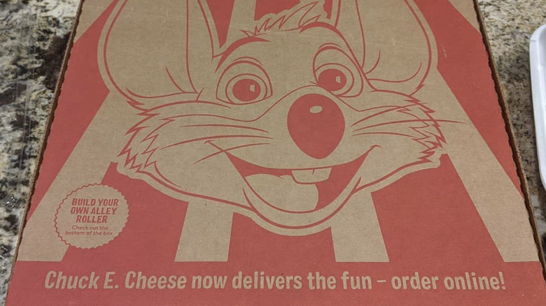 Chuck E. Cheese pizza delivery box