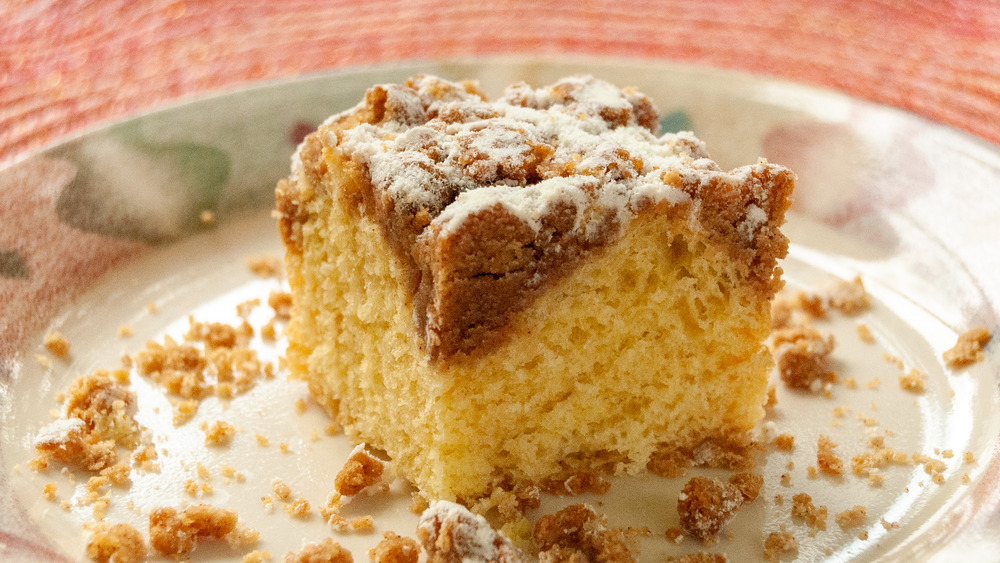 Slice of square crumb topped cake