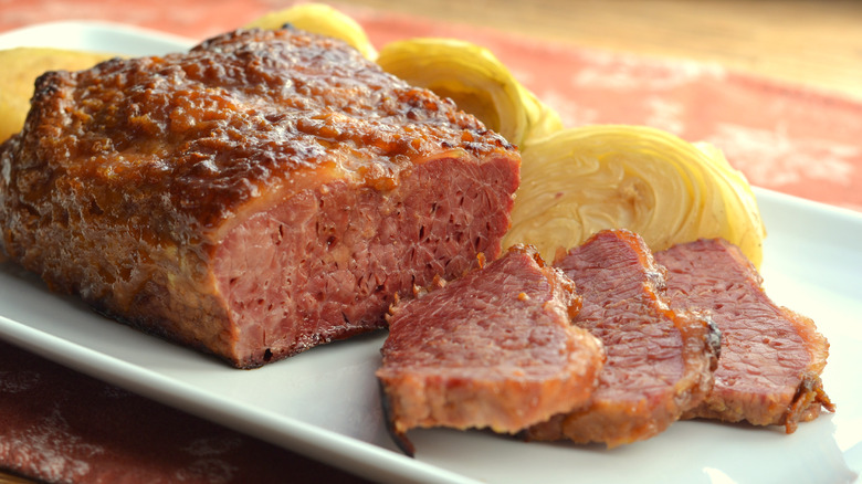 corned beef and cabbage on white plate