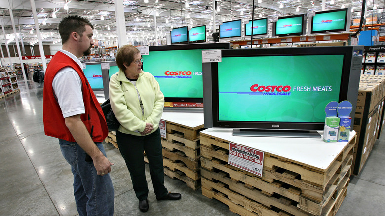 costco employee selling television