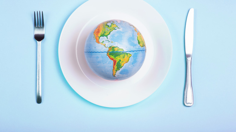 Earth globe on plate 