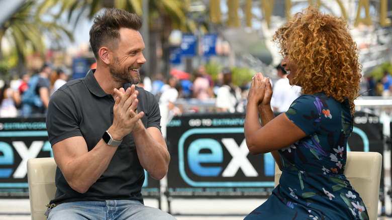 Joel McHale and Tanika Ray