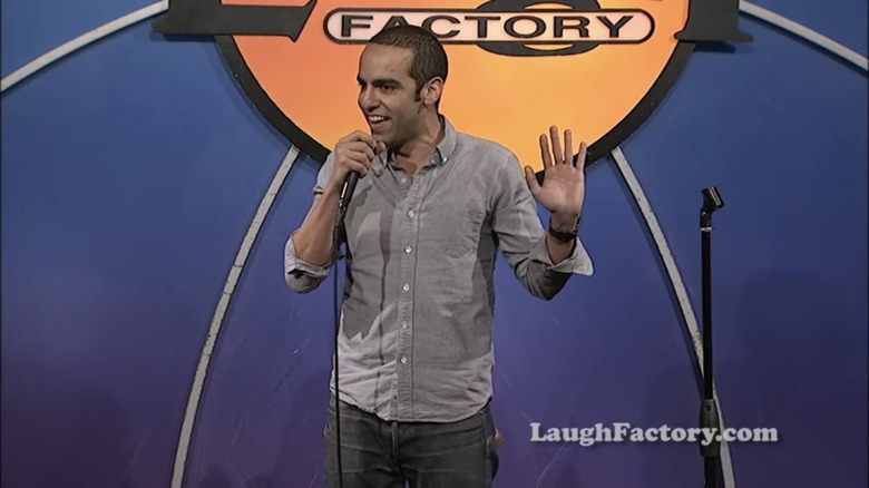 Dan Ahdoot performing standup comedy