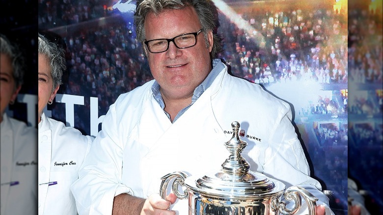 David Burke holding a trophy