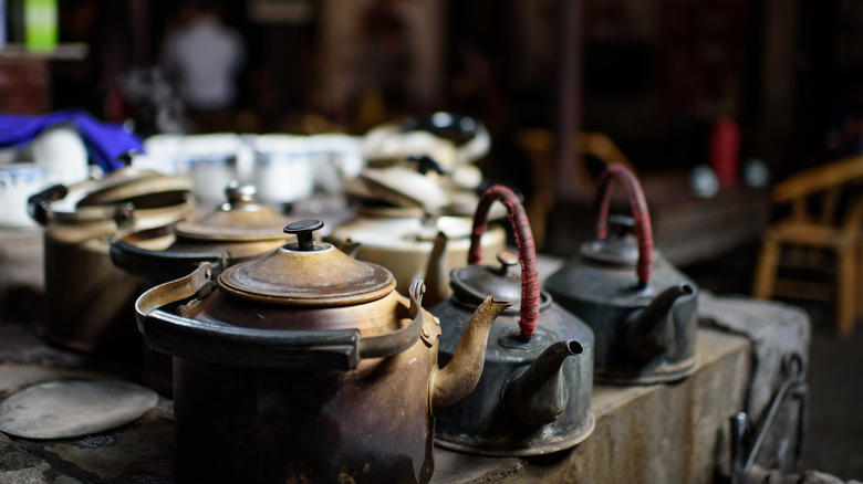 Tea in old tea pots