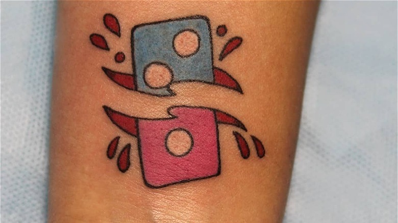 Domino's logo tattoo 