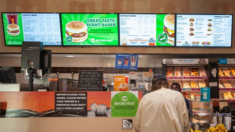 Menu and counter at Dunkin' location