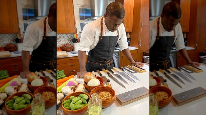 Edouardo Jordan looking at knives