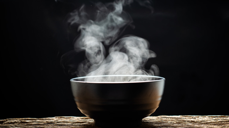 Steam rising from bowl