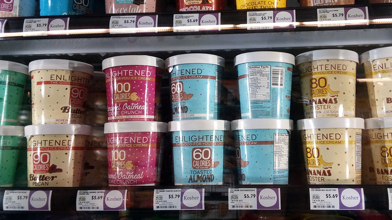 Multicolored cartons of Enlightened ice cream 