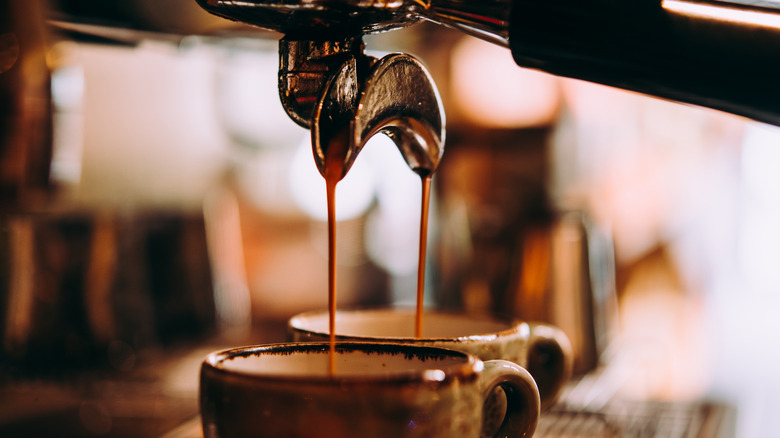 espresso machine pouring coffee