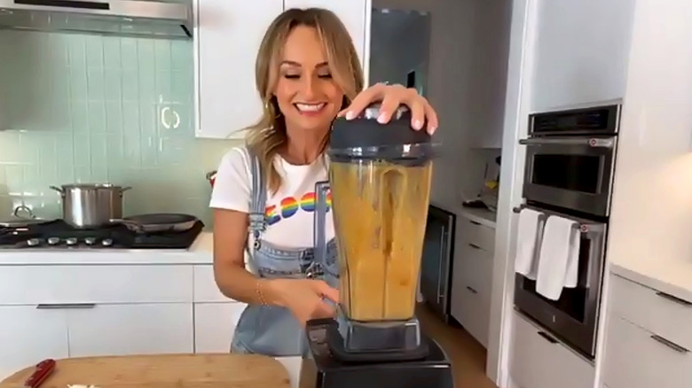 Giada, cooking in the kitchen