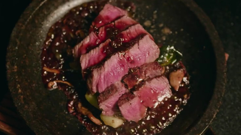 Steak on gray plate