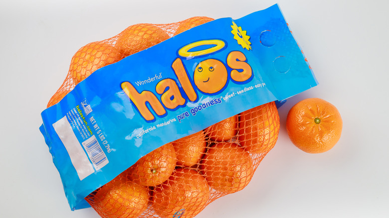 halos mandarins oranges in bag white background