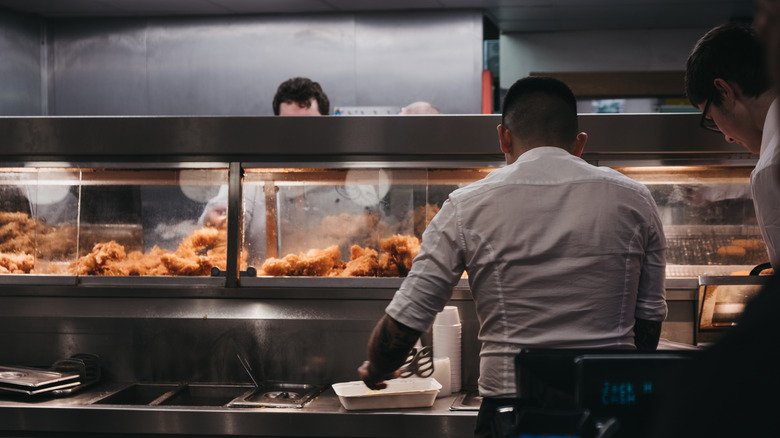 employees in fish and chips shop