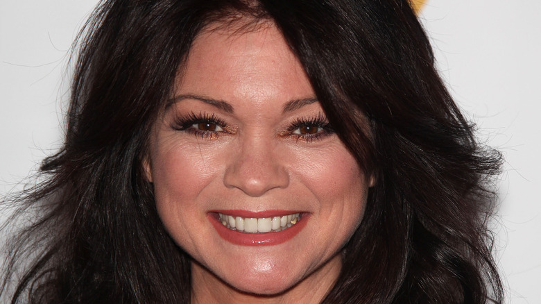 Close-up of Valerie Bertinelli smiling directly at the camera