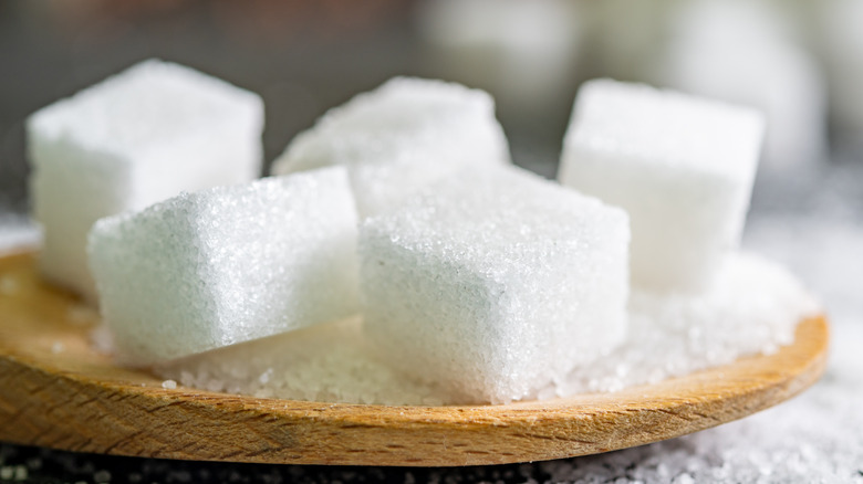 Sugar cubes on a plate.