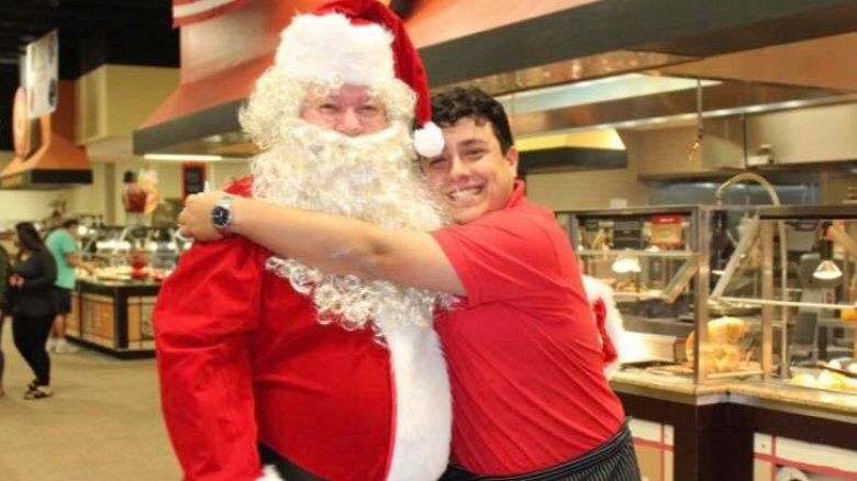 Golden Corral employee on Santa's lap