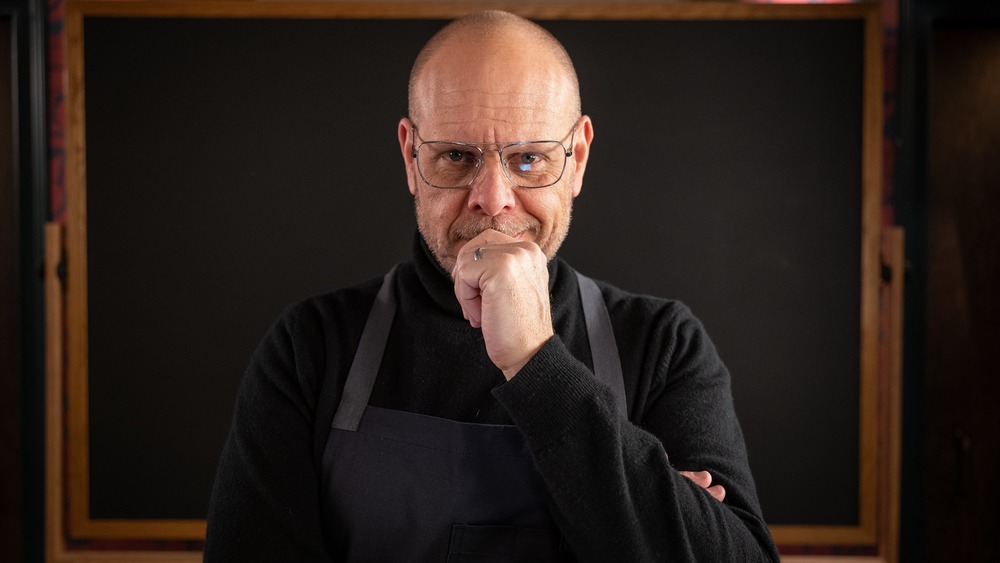 Alton Brown staring into camera