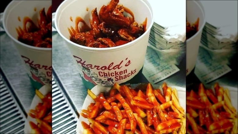 Harold's chicken in a bucket with fries