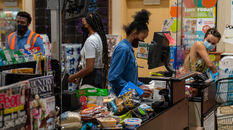 cashiers working at Harris Teeter