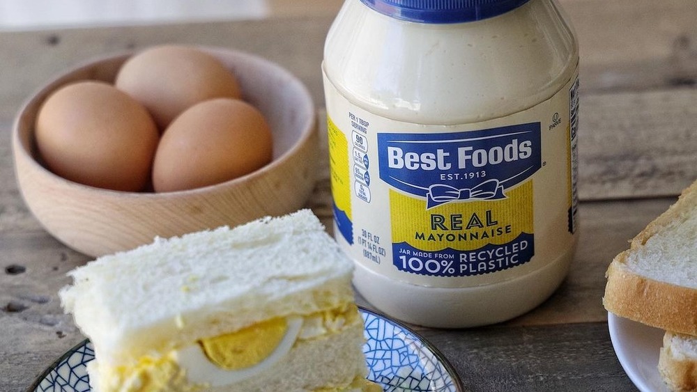 jar of Best Foods mayo with eggs and egg salad sandwich